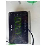 #14610-13 Alarm clock radios and sling shot