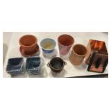 7 Assorted Flower Pots and a Storage Container