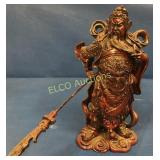 Red ceramic Oriental figurine of man holding sword