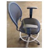 Black rolling office chair, mesh back, vinyl