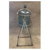 Metal stand for water bottle, tilting