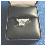 3ct. Emerald cut White Sapphire Solitaire ring,