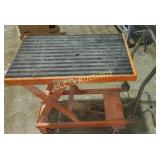Adjustable height, rolling work table, hydraulic