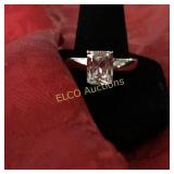 3ct. Emerald cut White Sapphire solitaire ring,