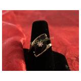 Onyx ring w/flower in middle, 14K Gold