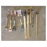 Lot of yard tools, shovels, pic axes, post hole