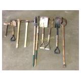 Lot of yard tools, shovels, picks, axes, post hole