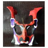 Cow pelvic bone painted as a mask, 16" x 11"