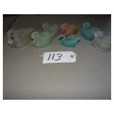 Seven small frosted glass swan candle holders