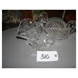 Three clear glass swans