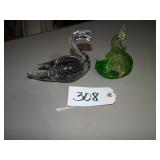 Two green art solid glass swans