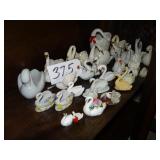 Assorted small swan planters and figurines
