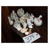 Assorted small swan planters and figurines
