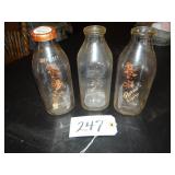 Three Parnell Dairy quart milk bottles