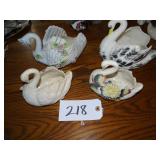 Four ceramic swan planters