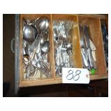 Drawer of assorted flatware