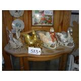Four assorted swan planters, 1 tin, 3 plastic