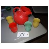 Vintage ribbed orange glass pitcher w/ 4 tumblers