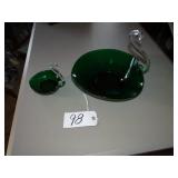 Two green art glass swan dishes, large and small