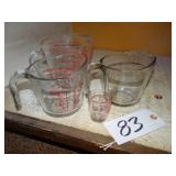 Assorted glass measuring pitchers