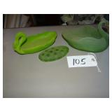 Two glass swan dishes and flower frog