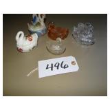 Five covered swan dishes
