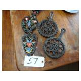 Four cast iron trivots