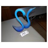 Two heavy blue art glass swans