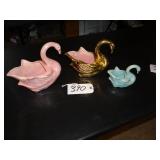 Three ceramic blue, gold, pink swan planters