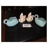 Two blue and two white/pink ceramic swan planters
