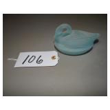 Frosted small blue swan on nest