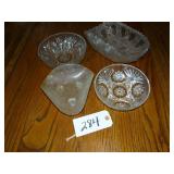 Assorted pressed glass bowls and footed etched bow