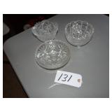 Three small footed glass bowls