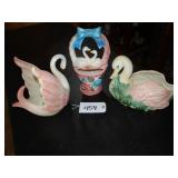 Three large ceramic swan planters