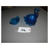 Two blue art glass swan dishes