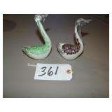 Two speckled art glass swan figures