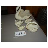 Five Lenox swan figures gold trimmed