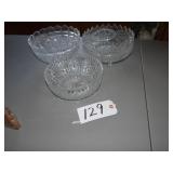 Three heavy glass serving bowls