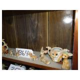 Shelf of deer figurines and deer cream pitchers