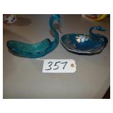 Two blue art glass swan dishes