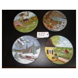 Four painted ceramic wall plates dï¿½cor