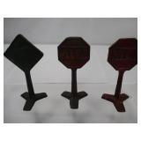 Three arcade cast iron road signs Three arcade cast iron road signs