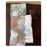 Small Wooden Item With Papers Inside