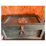 Large lockable wooden crate with softballs inside