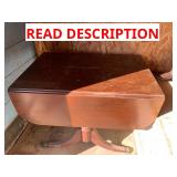 Antique wood table with two folding leaves read de