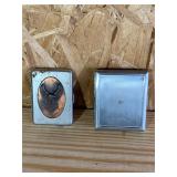 2 Metal cigarette carrying cases one is Harley Dav