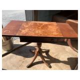 Small table with collapsible leaves needs refinish