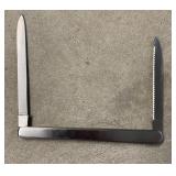 Thin silver knife