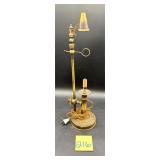 Vintage brass candlestick converted into an ele..