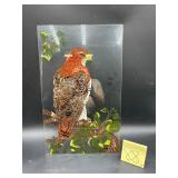 Glass painting featuring a detailed illustratio..